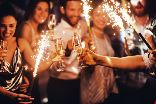 Group of friends toasting in the club